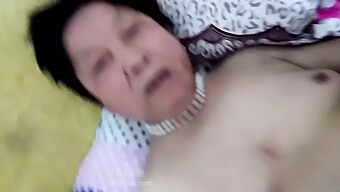 Aged Oriental Woman Engages In Sexual Activity