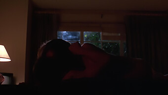 Seductive American Actress Kelly Preston In A Passionate Kissing Scene